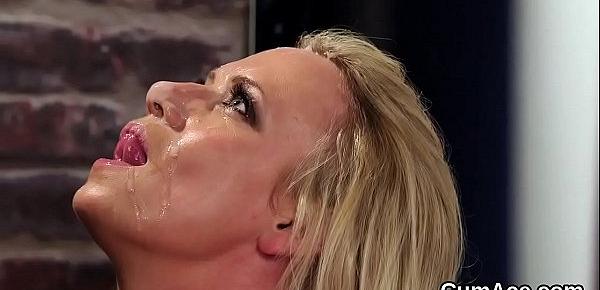  Randy beauty gets cumshot on her face eating all the charge